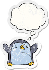 cartoon penguin and thought bubble as a distressed worn sticker