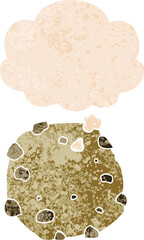 cartoon cookie and thought bubble in retro textured style