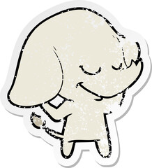 distressed sticker of a cartoon smiling elephant