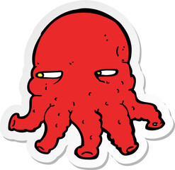 sticker of a cartoon alien face