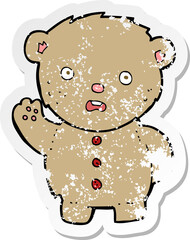 retro distressed sticker of a cartoon unhappy teddy bear