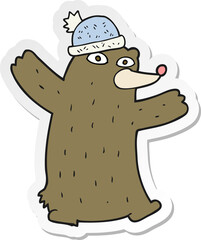sticker of a cartoon bear wearing hat