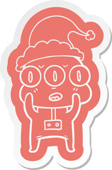 cartoon  sticker of a three eyed alien wearing santa hat