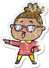 distressed sticker of a cartoon happy woman wearing spectacles