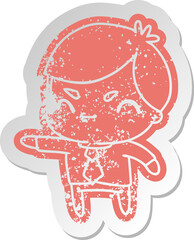 distressed old sticker of a kawaii cute boy