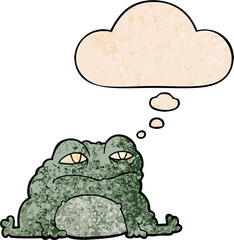 cartoon toad and thought bubble in grunge texture pattern style