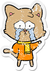 distressed sticker of a cartoon crying cat