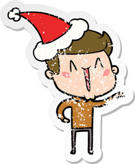 distressed sticker cartoon of a excited man wearing santa hat