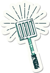 grunge sticker of tattoo style kitchen spatula