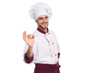 Positive professional happy man chef showing tasty ok sign isolated on transparent background - 580649482