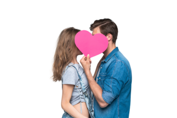 Couple smiling at camera holding a heart on transparent background