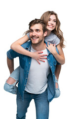 Cute portrait of couple. Guy rolls a girl on his back