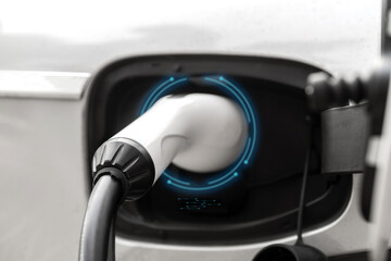 Electric vehicle charging battery EV car power with plug cable for vehicle clean energy and eco green power.technology of electric car concept