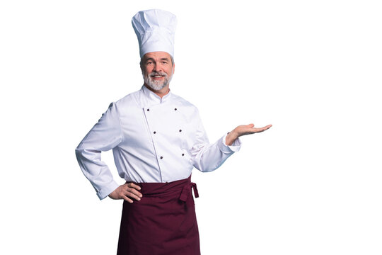 Portrait of a happy chef cook showing copyspace on the palms isolated on transparent background
