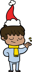 line drawing of a happy boy wearing santa hat