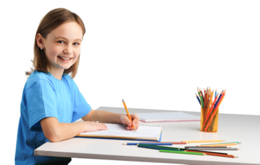 Cute little preschooler child girl drawing or studing