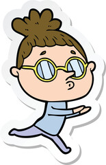 sticker of a cartoon woman wearing glasses