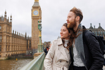 Young family couple spends a weekend in London sightseeing