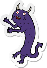 sticker of a cartoon devil