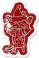 cartoon icon of a cat wearing santa hat