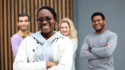 Fototapeta premium Young handsome editor is looking at the camera