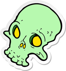 sticker of a cartoon spooky skull