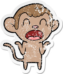 distressed sticker of a shouting cartoon monkey shrugging shoulders