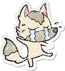 distressed sticker of a cartoon crying wolf