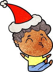 textured cartoon of a man pouting wearing santa hat