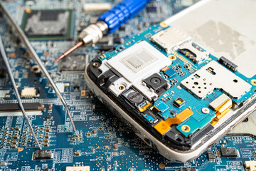 Repairing and upgrade mobile phone, electronic, computer hardware and technology concept.