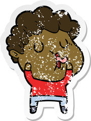 distressed sticker of a cartoon man pulling face