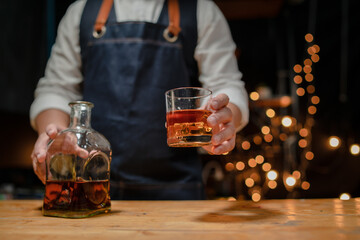 Barman pouring whiskey whiskey glass beautiful night