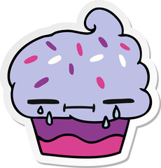 sticker cartoon of a crying cupcake