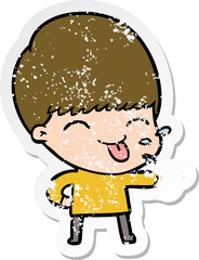 distressed sticker of a cartoon boy sticking out tongue