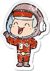 distressed sticker of a happy cartoon astronaut