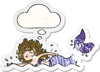 cartoon mermaid and thought bubble as a distressed worn sticker