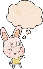cartoon rabbit and thought bubble in grunge texture pattern style