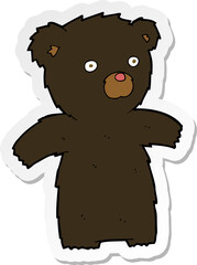sticker of a cartoon black bear