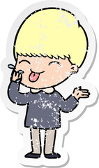distressed sticker of a cartoon boy sticking out tongue