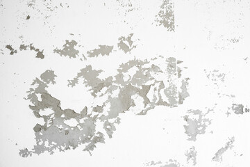 The White weathered wall with flaking paint background.