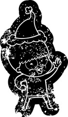 happy cartoon distressed icon of a boy wearing santa hat