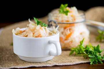 Sauerkraut with carrots and spices in a bowl