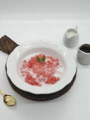 Bubur Sagu Mutiara, Indonesian Dessert Porridge. Made from pearl sago (sagu mutiara), sugar, pandan leaves, and coconut milk. Space for text