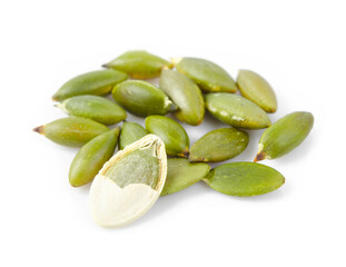 The pile of raw pepitas isolated on white.