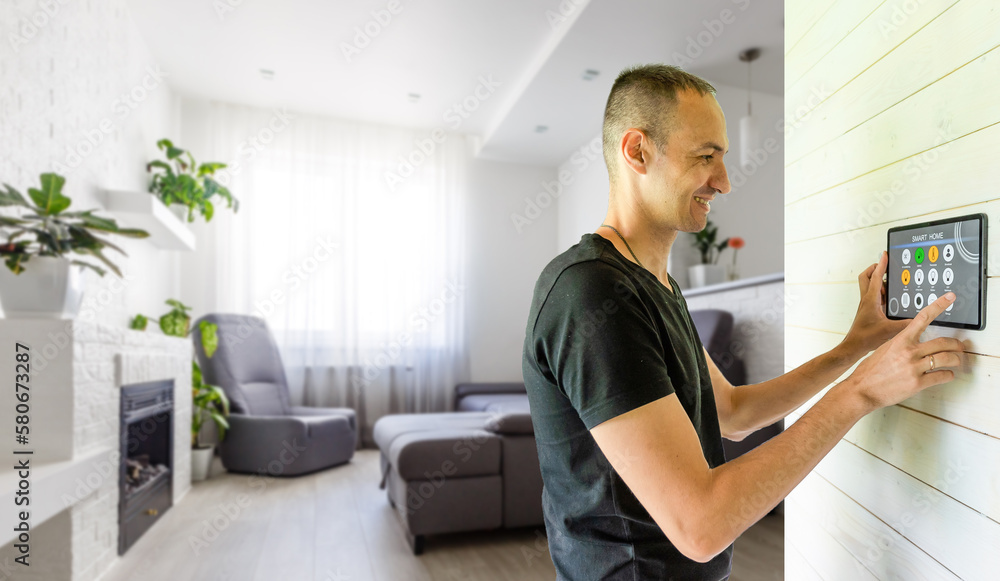 Poster smart home control application. man controls household appliances through a smartphone. hands with a