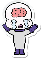 sticker of a cartoon big brain alien crying