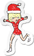 Obraz premium retro distressed sticker of a cartoon woman excited for christmas