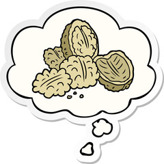 cartoon walnuts and thought bubble as a printed sticker
