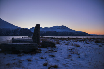 View from the island of Kvaloya, a very beautiful landscape opens up with a bridge and mountains