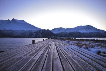 View from the island of Kvaloya, a very beautiful landscape opens up with a bridge and mountains